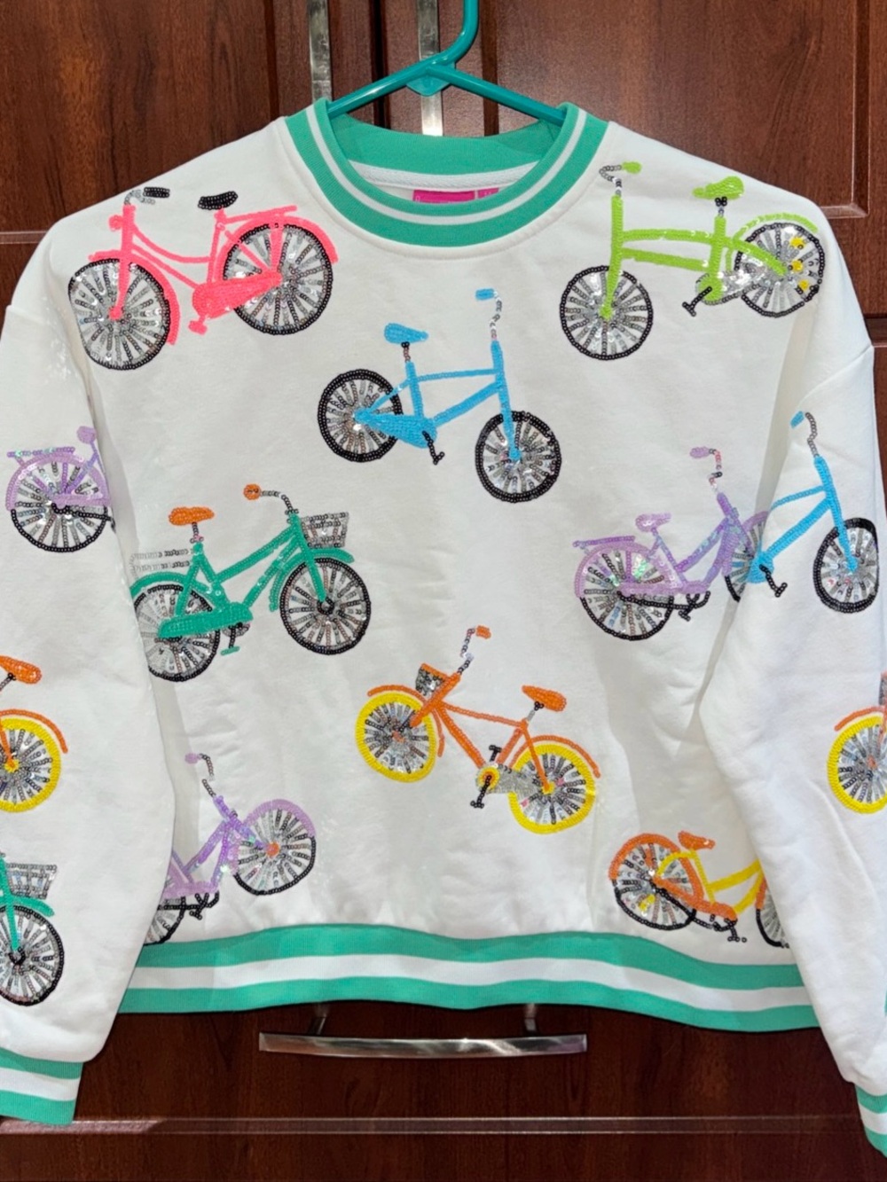 🚲NWOT Queen Of Sparkles GIRLS M (Oversized) Sequined Bicycle Sweatshirt